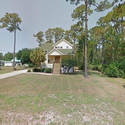 123 Dewberry St, Dauphin Island, AL 36528