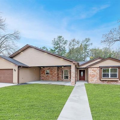 34803 High Oak Ln, Pinehurst, TX 77362