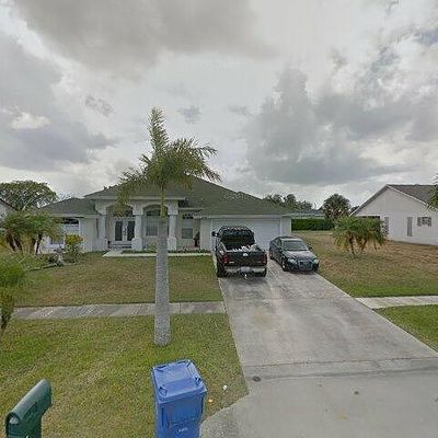 266 La Mancha Ave, Royal Palm Beach, FL 33411