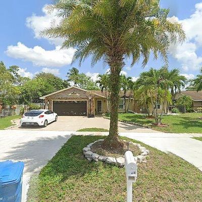 104 Park Rd N, Royal Palm Beach, FL 33411