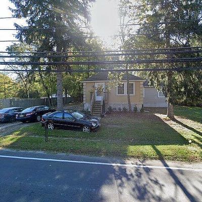 7 Tennent Rd, Morganville, NJ 07751