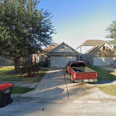 12323 Carriage Oak Cir, Humble, TX 77346