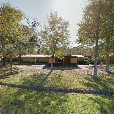 1014 Pine Needles Dr, Sour Lake, TX 77659