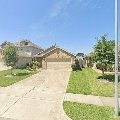 10711 Sun River Falls Dr, Humble, TX 77396