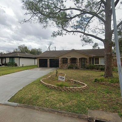 14135 Woodthorpe Ln, Houston, TX 77079