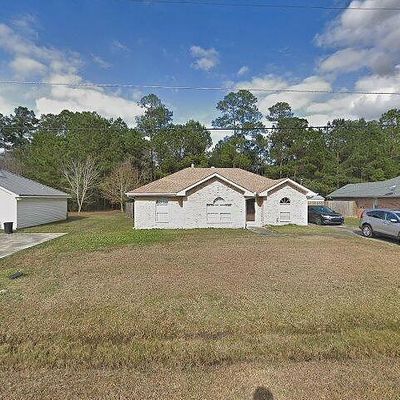 135 S Cherrywood Ln, Pearl River, LA 70452