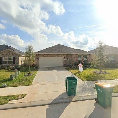 1910 Hidden Cedar Dr, Conroe, TX 77301