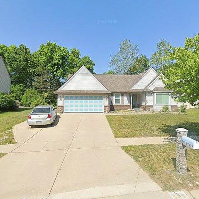 506 Harbour Pointe Dr, Belleville, MI 48111