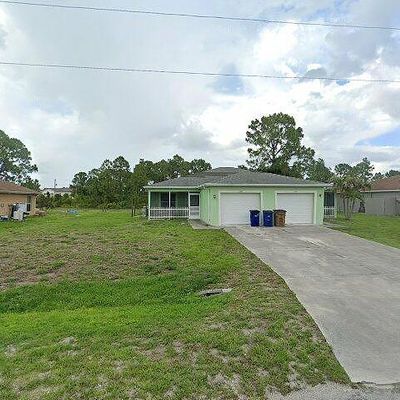 669 Chestnut St E, Lehigh Acres, FL 33974