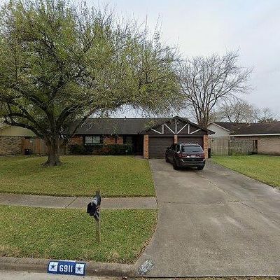 6911 Winding Trace Dr, Houston, TX 77086