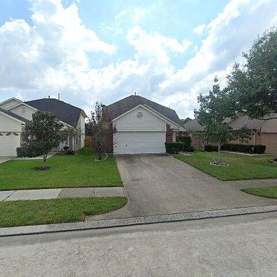 11631 Rolling Stream Dr, Tomball, TX 77375