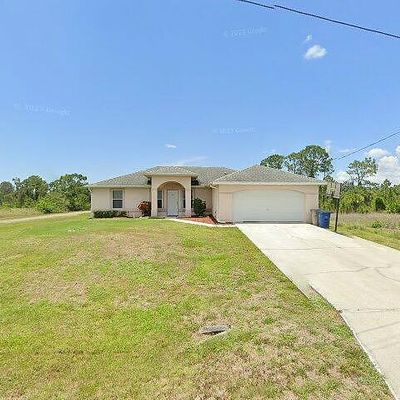 919 Commodore St, Lehigh Acres, FL 33974