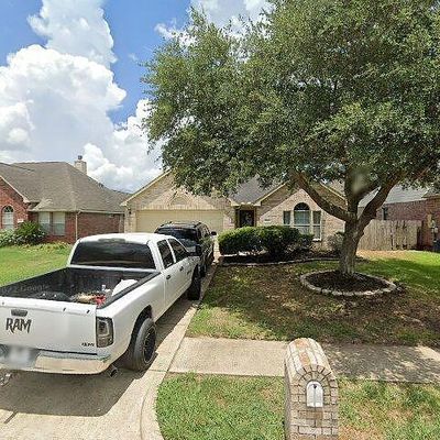 1306 S Teal Estates Cir, Fresno, TX 77545