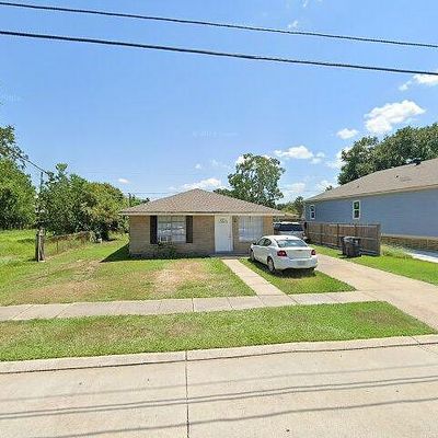 2221 Riverbend Dr, Violet, LA 70092