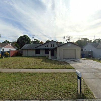 2726 Blossom Lake Dr, Holiday, FL 34691