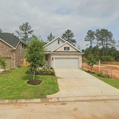 719 Lacebark Elm Trl, Willis, TX 77318