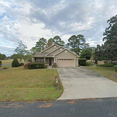 1 W Pine Ct, Carolina Shores, NC 28467