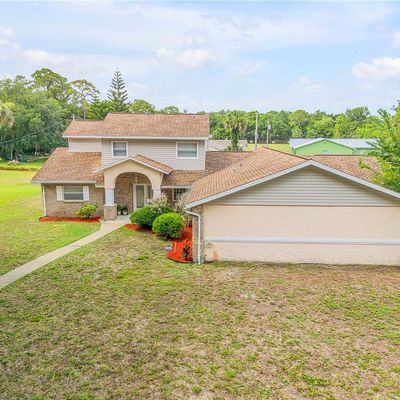 299 W Hickory Ave, Oak Hill, FL 32759