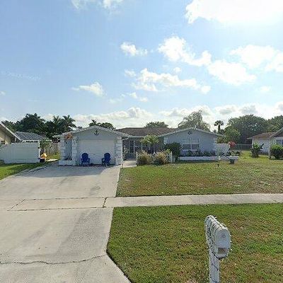 908 Camellia Dr, Royal Palm Beach, FL 33411