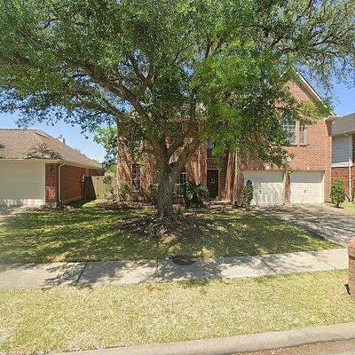 12218 Meadowglen Dr, Meadows Place, TX 77477