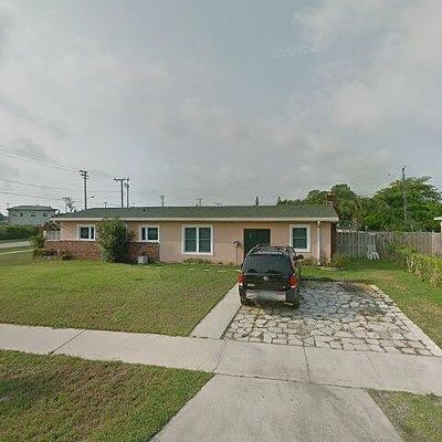 704 Date Palm Dr, West Palm Beach, FL 33403