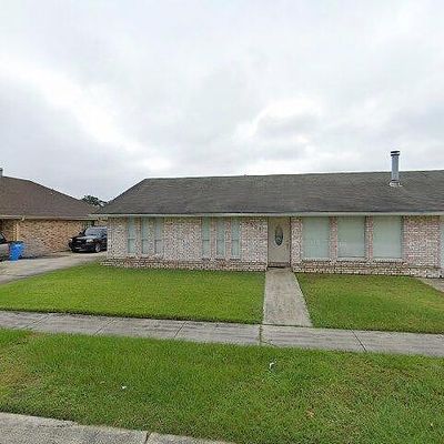 3309 Moss Ln, Violet, LA 70092