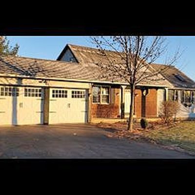 65 Woodstock Ln, Brockport, NY 14420