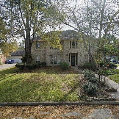 5806 Woodland Falls Dr, Kingwood, TX 77345