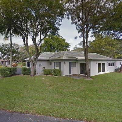 3700 Oaks Clubhouse Dr #203, Pompano Beach, FL 33069