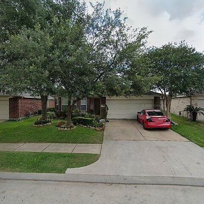 9718 Summer Laurel Ln, Houston, TX 77088