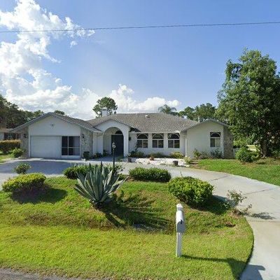 52 Wood Center Ln, Palm Coast, FL 32164