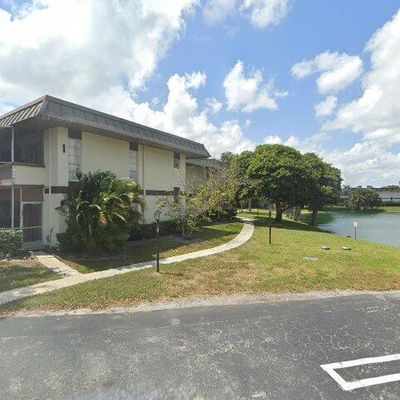 1 Greenway Vlg N #110, Royal Palm Beach, FL 33411