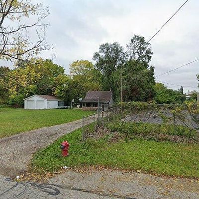 5637 Hughes Rd, Lansing, MI 48911