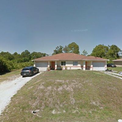 1108/1110 Ivan Ave S, Lehigh Acres, FL 33973