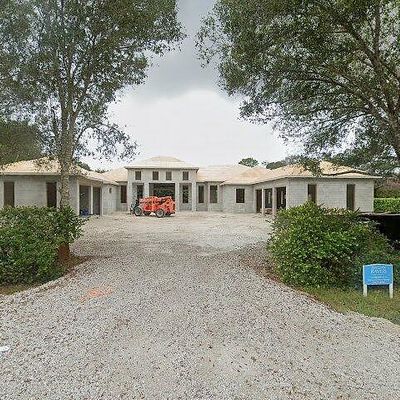 475 Carica Rd, Naples, FL 34108