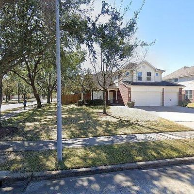 9703 Trailing Moss Dr, Houston, TX 77064