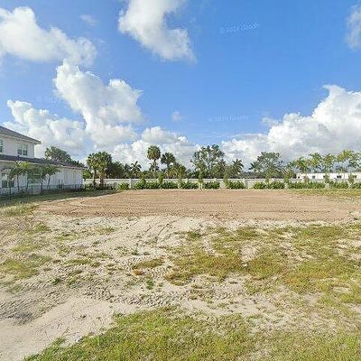 9148 Coral Isles Cir #{ 13}, Palm Beach Gardens, FL 33412