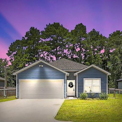 11242 Magnolia Dr, Plantersville, TX 77363