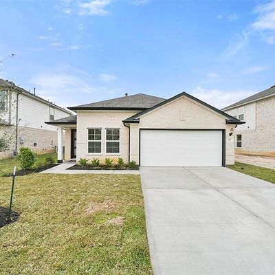 213 Harlingen Dr, Magnolia, TX 77354