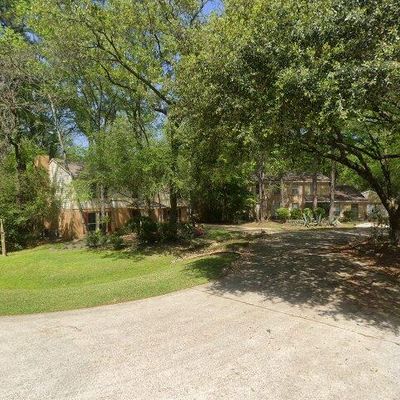 3 E Wandering Oak Dr, Spring, TX 77381