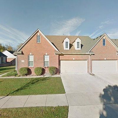 49849 Rifle River Dr, Macomb, MI 48042