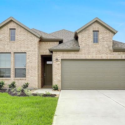 810 Whispering Winds Dr, Beasley, TX 77417