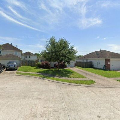 906 Whispering Winds Ct, Baytown, TX 77521