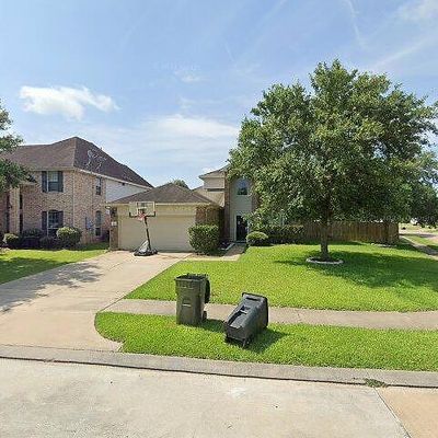 9131 Creekside Ct, Hitchcock, TX 77563