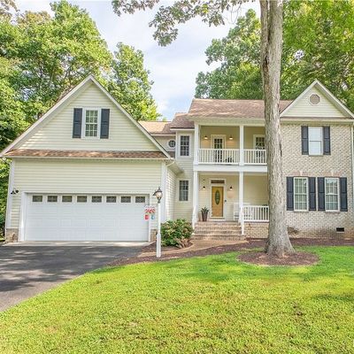 69 Riverboat Ln E, Hartfield, VA 23071