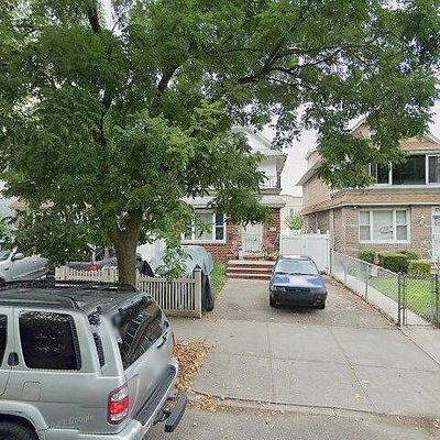 8313 Myrtle Ave, Glendale, NY 11385