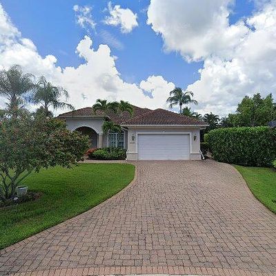 8983 Star Tulip Ct, Naples, FL 34113