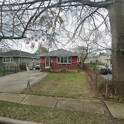 86 Decatur St, Roosevelt, NY 11575