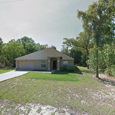 9269 N Alpinia Dr, Citrus Springs, FL 34434