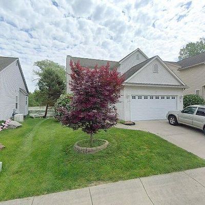 409 Mill Pond Dr, Fenton, MI 48430